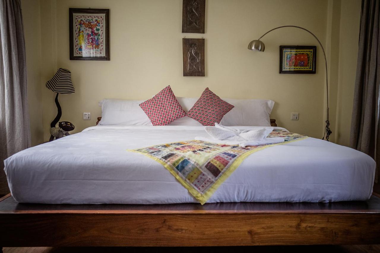 Mingtang Garden Cottage 名堂花园度假屋 Pokhara Esterno foto